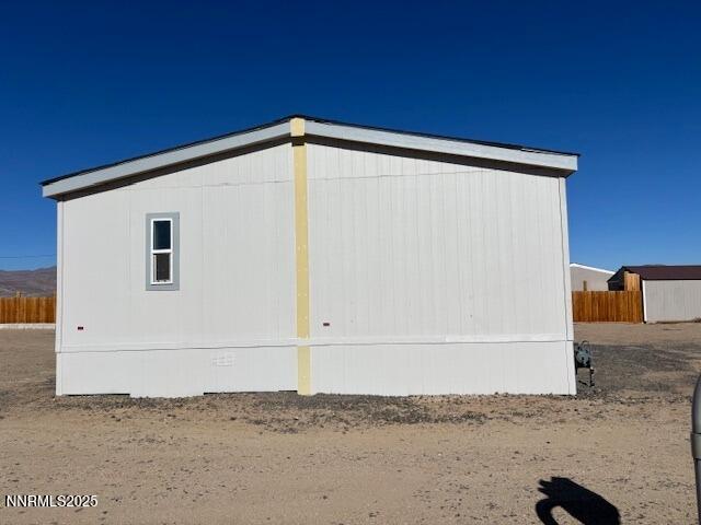 3599 Ardmore Street Silver Springs, NV 89429 - Photo 23 of 29 a view of back yard of the house