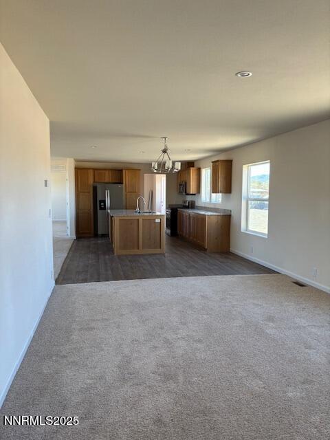 3599 Ardmore Street Silver Springs, NV 89429 - Photo 7 of 29 a living room with a couch and a large window