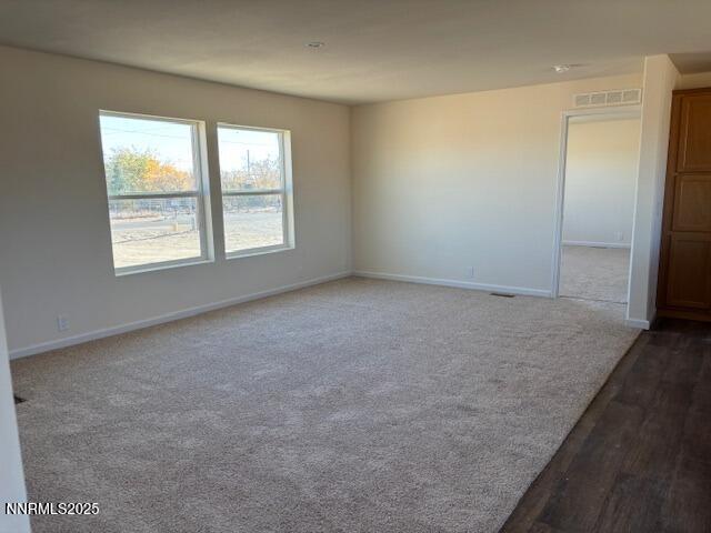 3599 Ardmore Street Silver Springs, NV 89429 - Photo 9 of 29 an empty room with windows