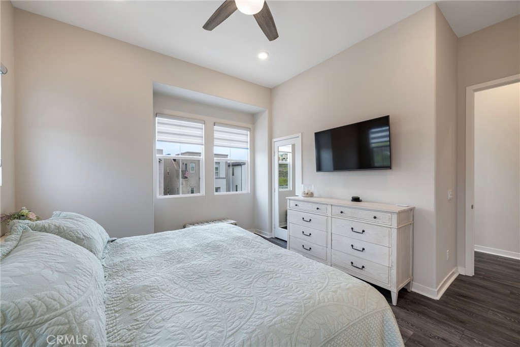 6 Pony Court Rancho Mission Viejo, CA 92694 - Photo 15 of 35 a bedroom with a flat screen television and a bed