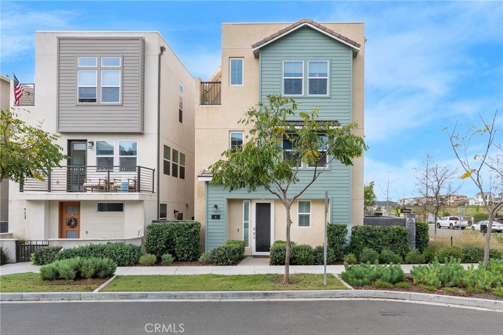 6 Pony Court Rancho Mission Viejo, CA 92694 - Photo 2 of 35 a front view of a house with a garden