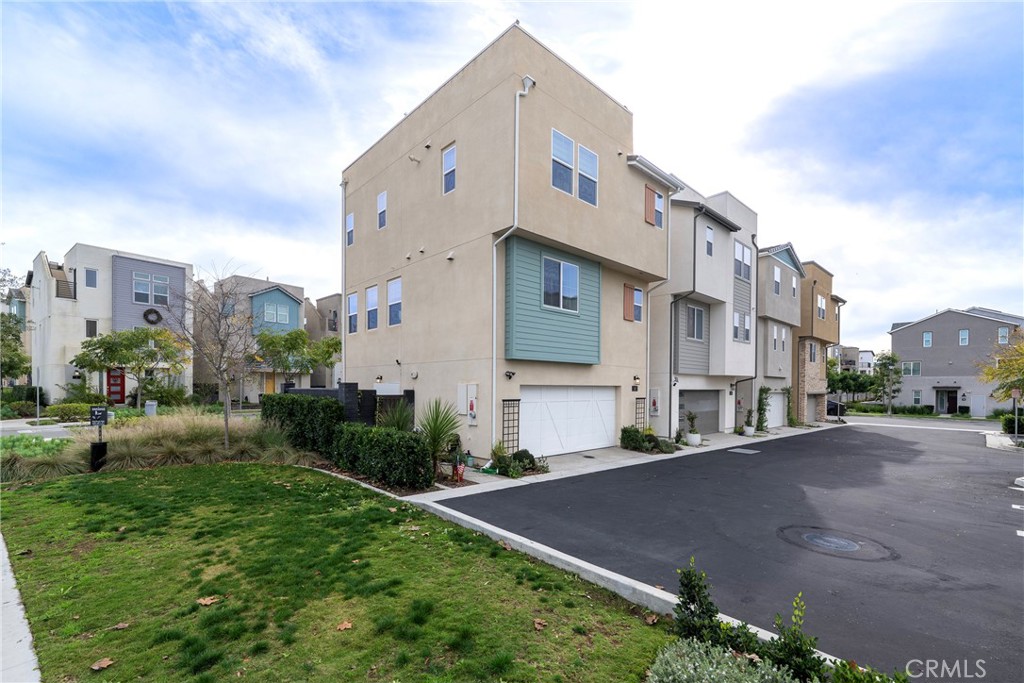 6 Pony Court Rancho Mission Viejo, CA 92694 - Photo 25 of 35 a front view of a building with garden