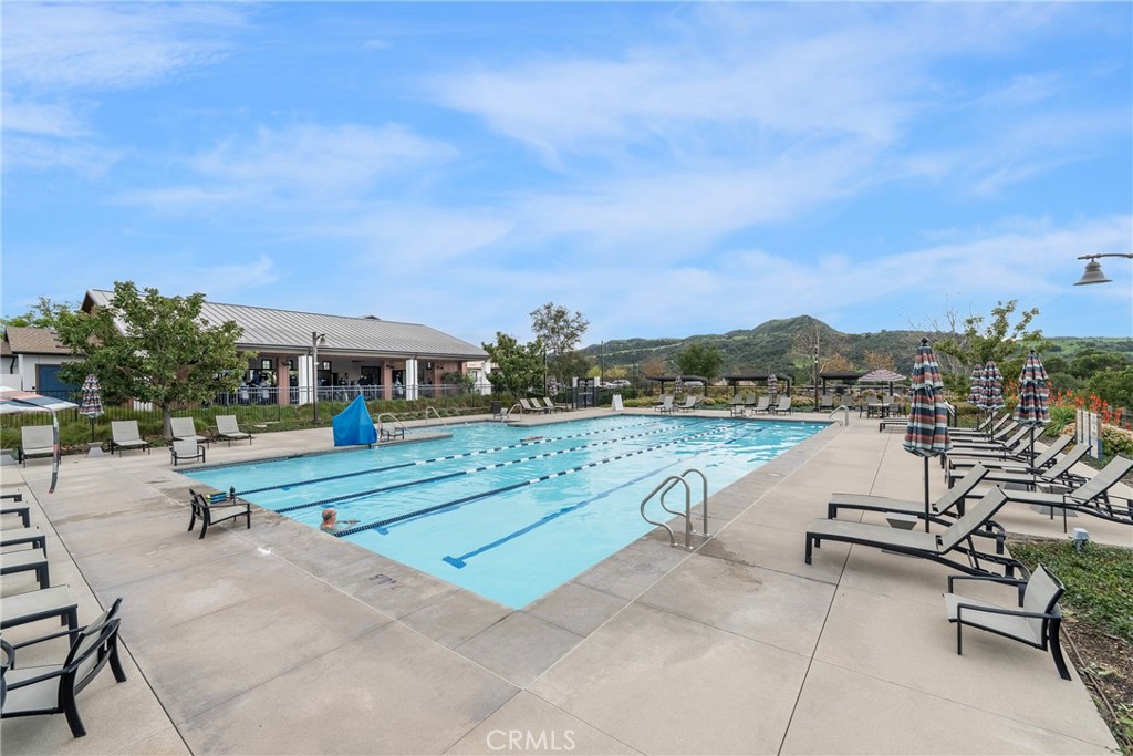 6 Pony Court Rancho Mission Viejo, CA 92694 - Photo 28 of 35 a view of swimming pool and outdoor seating