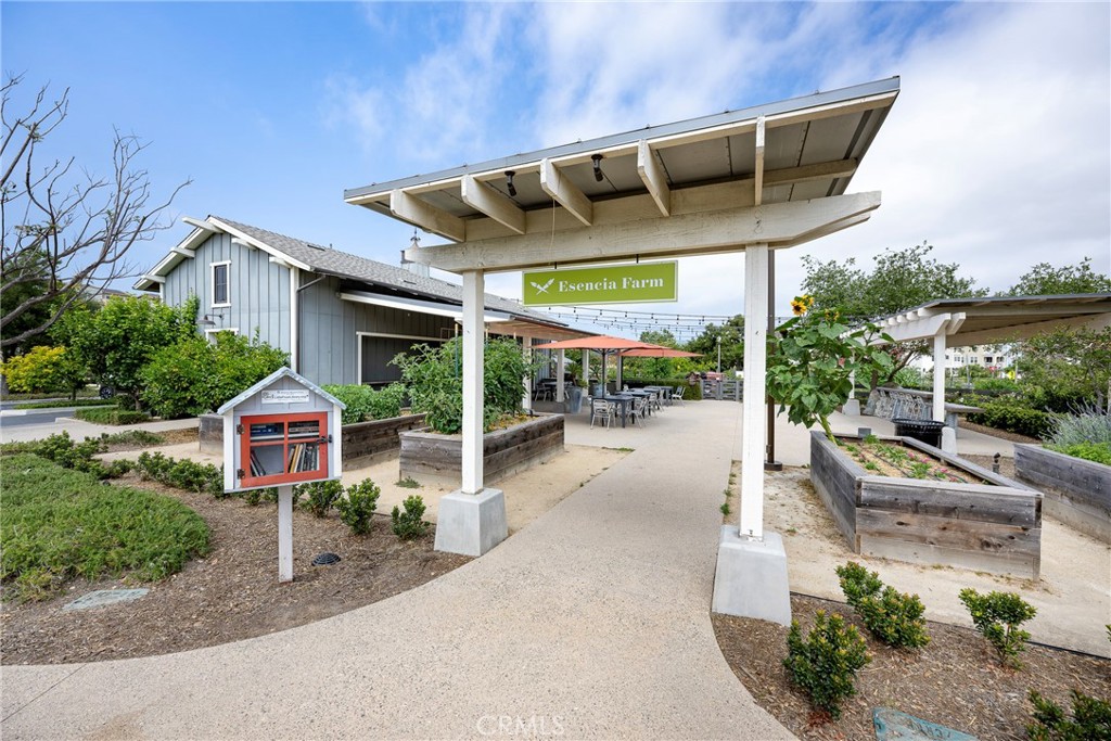 6 Pony Court Rancho Mission Viejo, CA 92694 - Photo 31 of 35 a view of a patio with a table and chairs under an umbrella