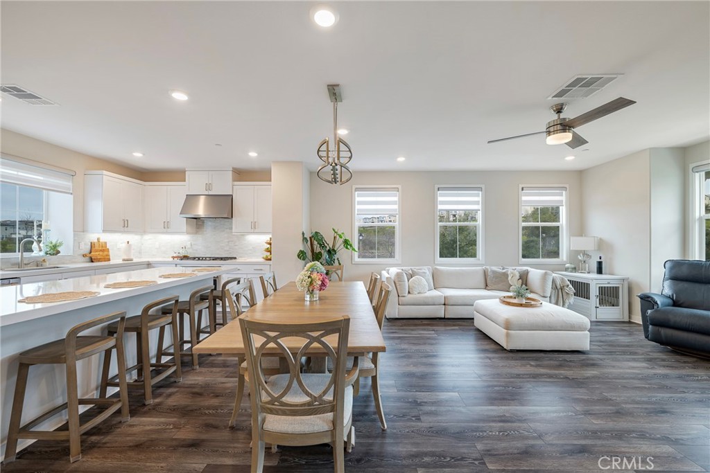 6 Pony Court Rancho Mission Viejo, CA 92694 - Photo 5 of 35 a view of a dining room and livingroom with furniture wooden floor a chandelier