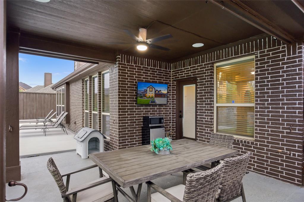 1802 Roundtree Road Forney, TX 75126 - Photo 39 of 39 a backyard of a house with seating space