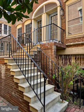 a view of a balcony with staircase