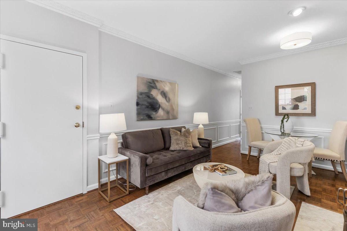 208 Justice Court Northeast, Unit 44 Washington, DC 20002 - Photo 6 of 26 a living room with furniture and a potted plant