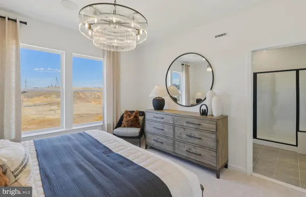 a bed room with a bed and a window