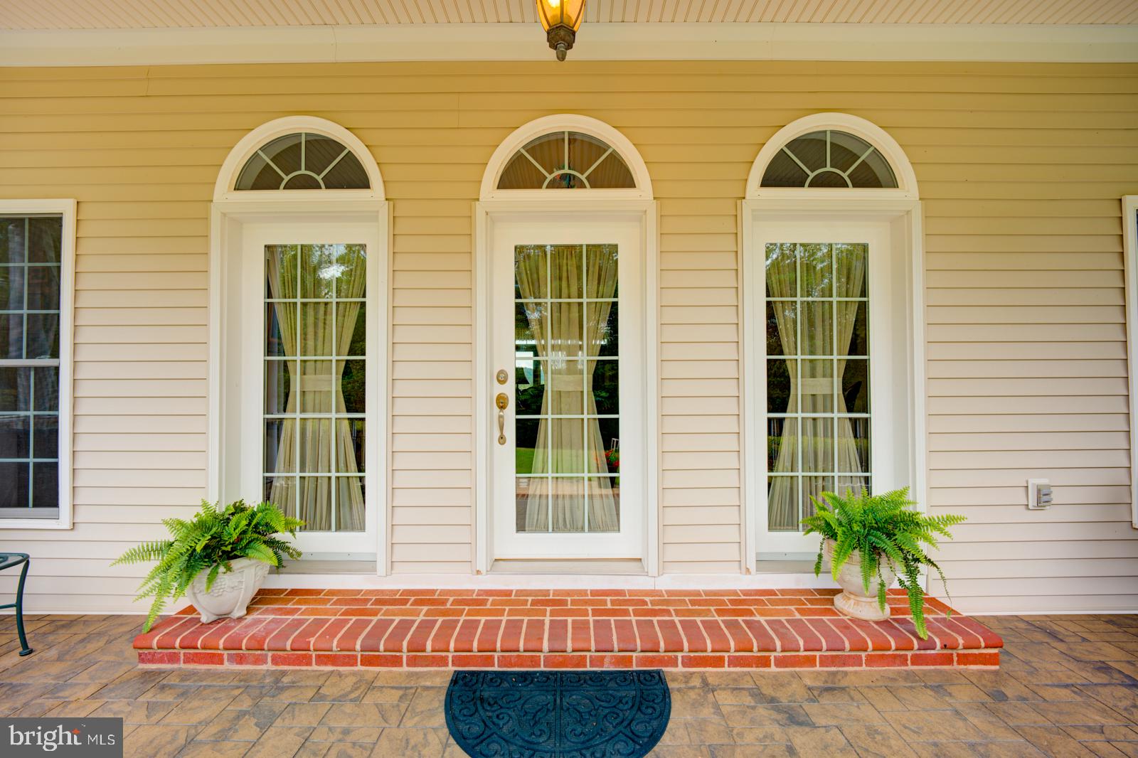 6542 Pine Stake Road Culpeper, VA 22701 - Photo 79 of 113 Charming entrance with elegant arches.