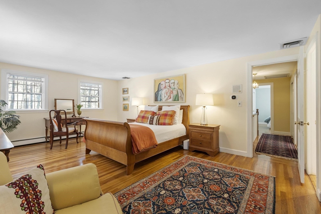265 College Road Concord, MA 01742 - Photo 22 of 42 a bedroom with furniture and a rug
