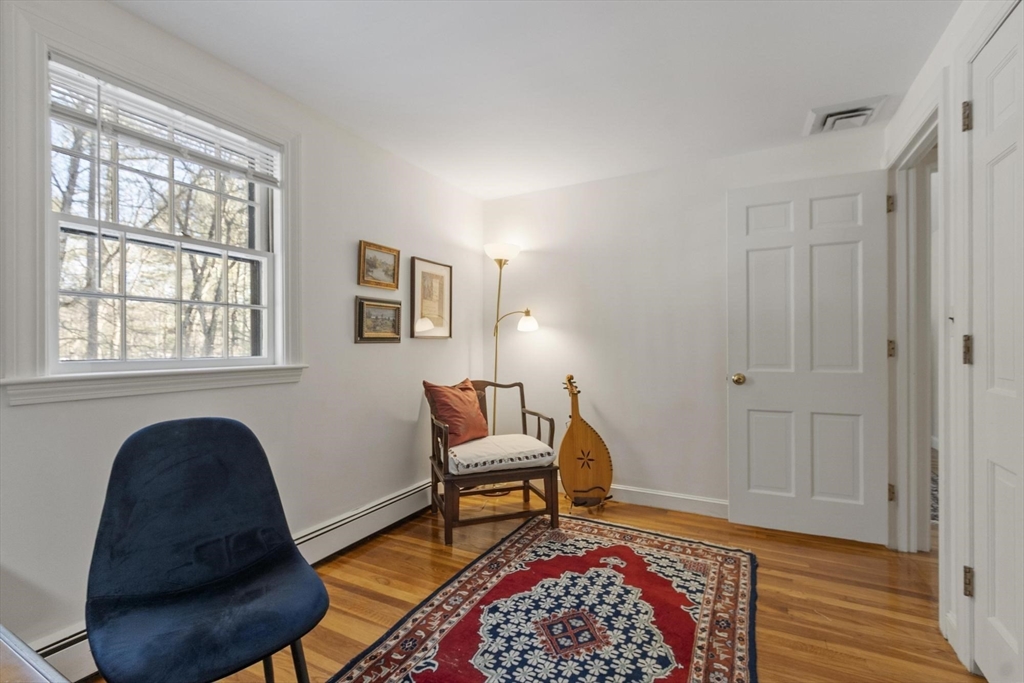 265 College Road Concord, MA 01742 - Photo 30 of 42 a living room with furniture and a window