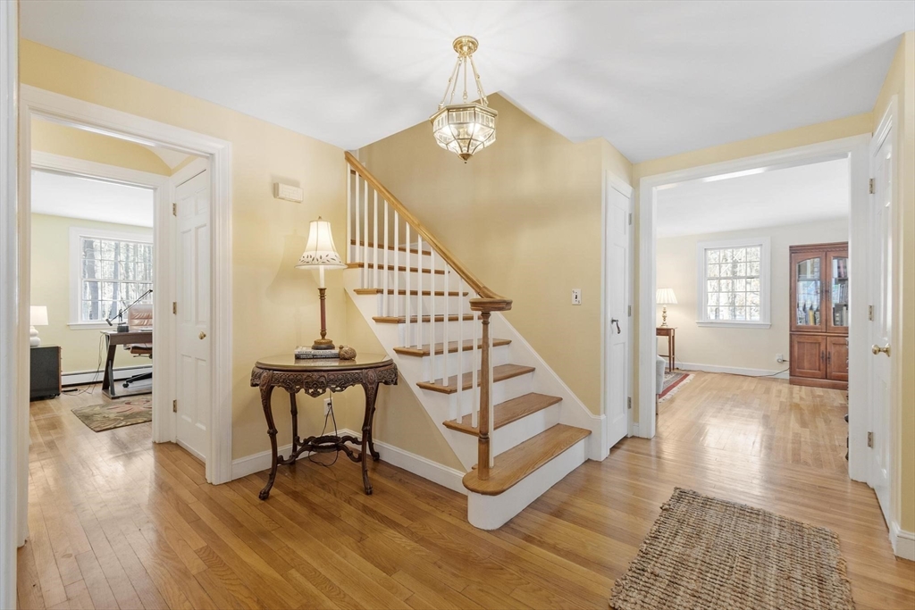 265 College Road Concord, MA 01742 - Photo 5 of 42 a view of a livingroom with furniture and hardwood floor