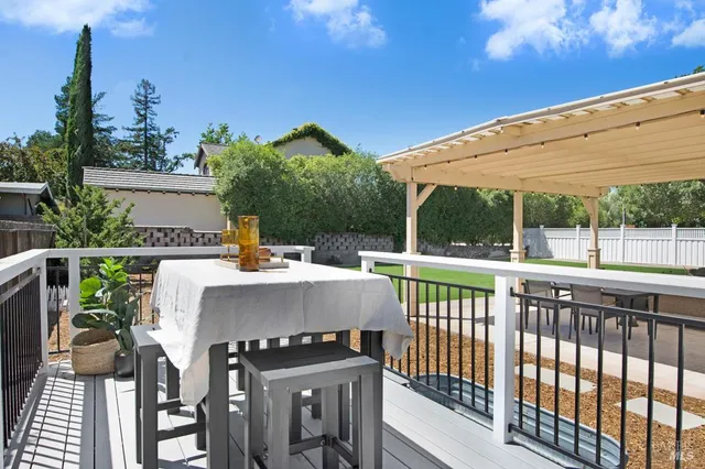 a view of a patio with furniture