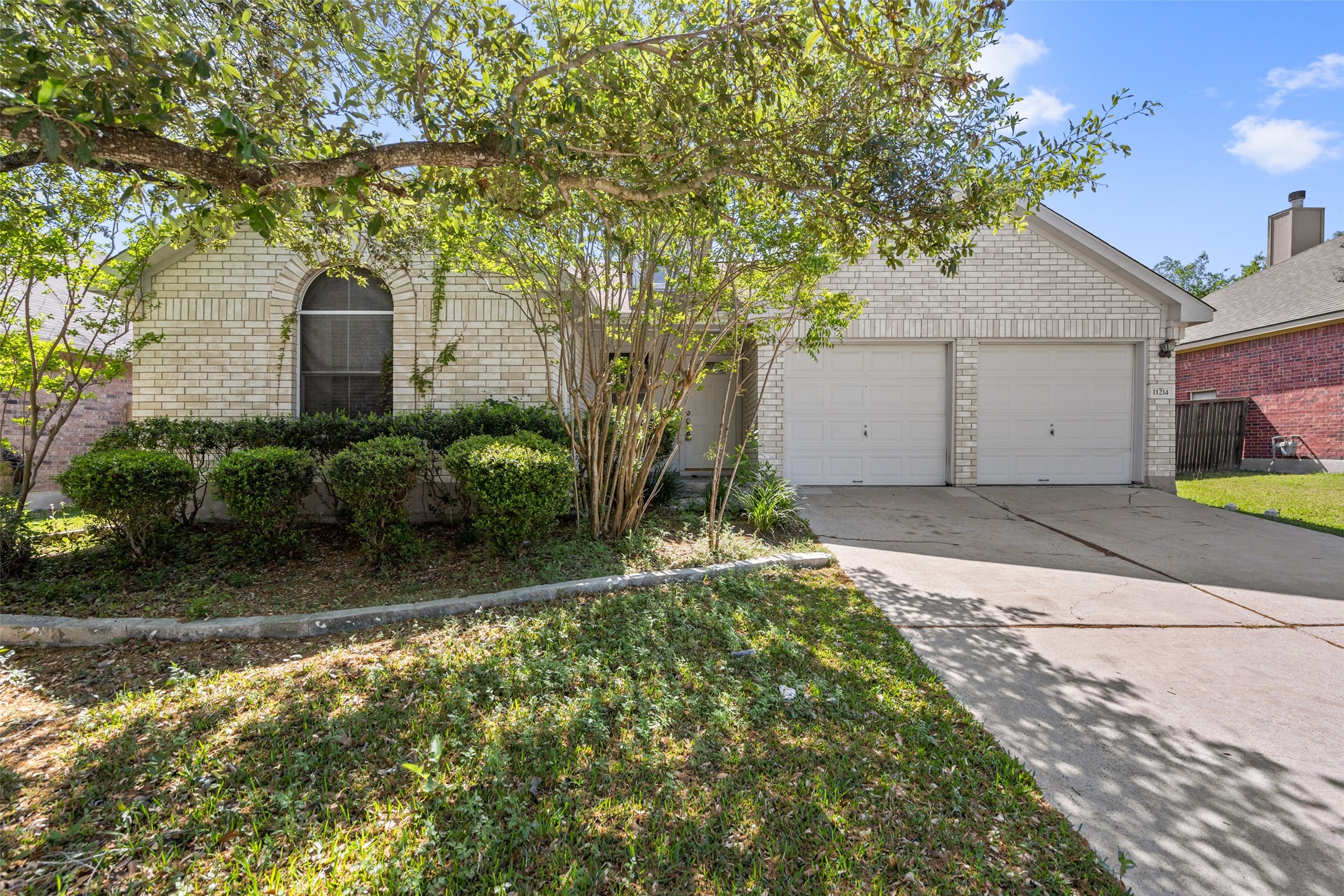 a backyard of a house with lots of green space