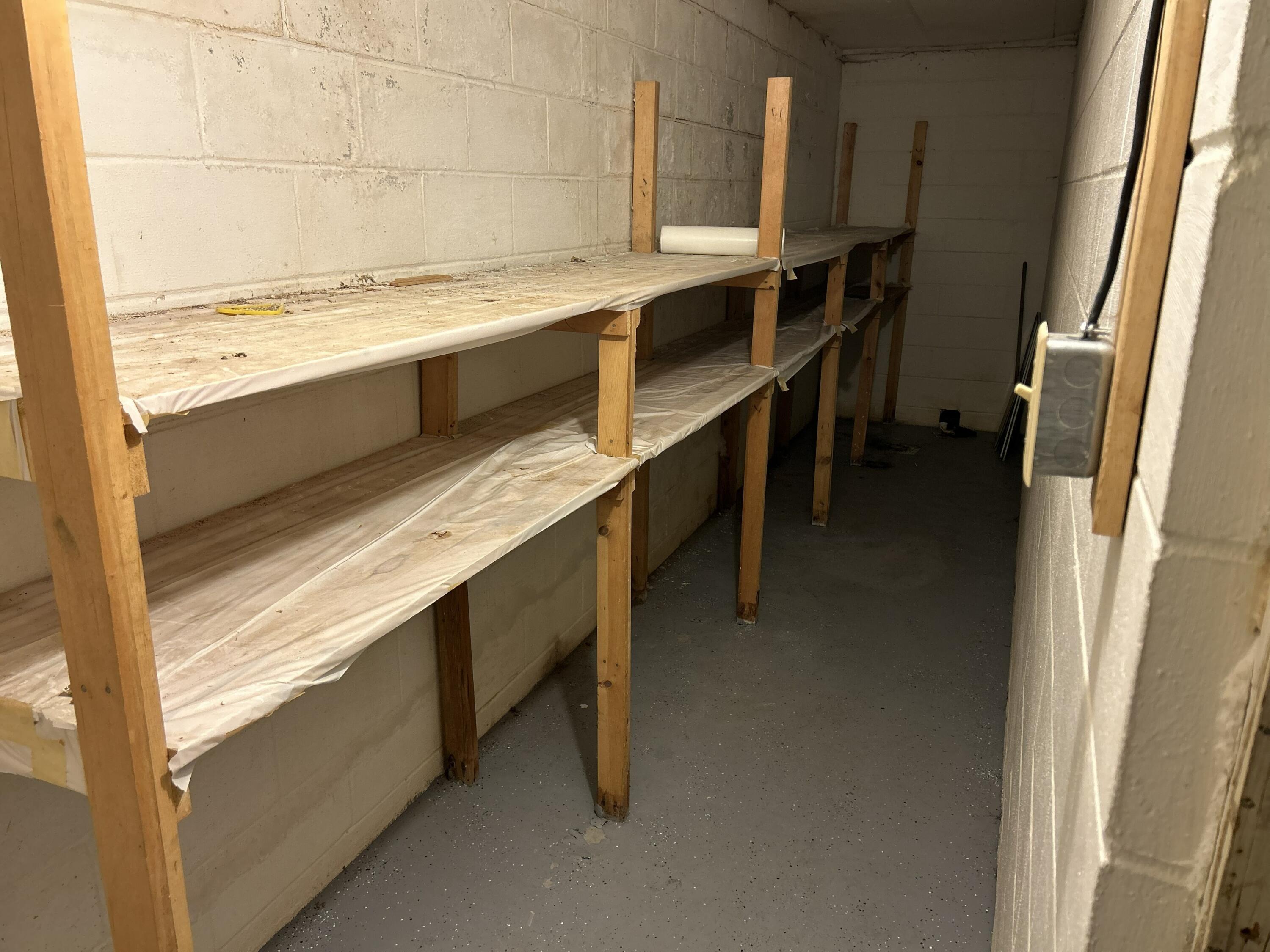 8887 Galbraith Road Cheboygan, MI 49721 - Photo 19 of 38 19 basement storage room