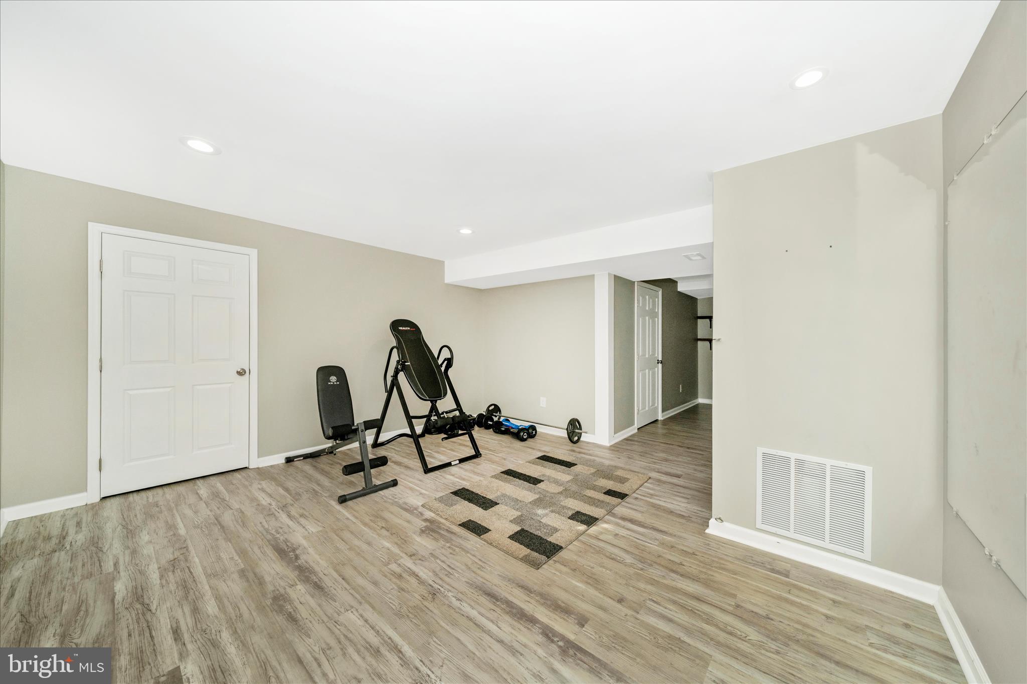 8730 Mapleville Road Mount Airy, MD 21771 - Photo 38 of 65 a view of a room with gym equipment