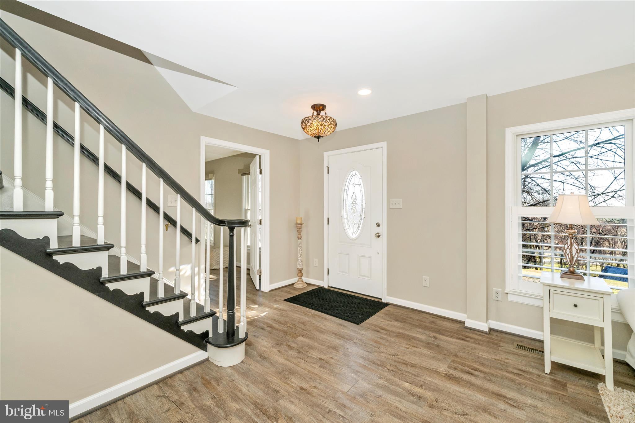 8730 Mapleville Road Mount Airy, MD 21771 - Photo 4 of 65 a view of an entryway with wooden floor and door