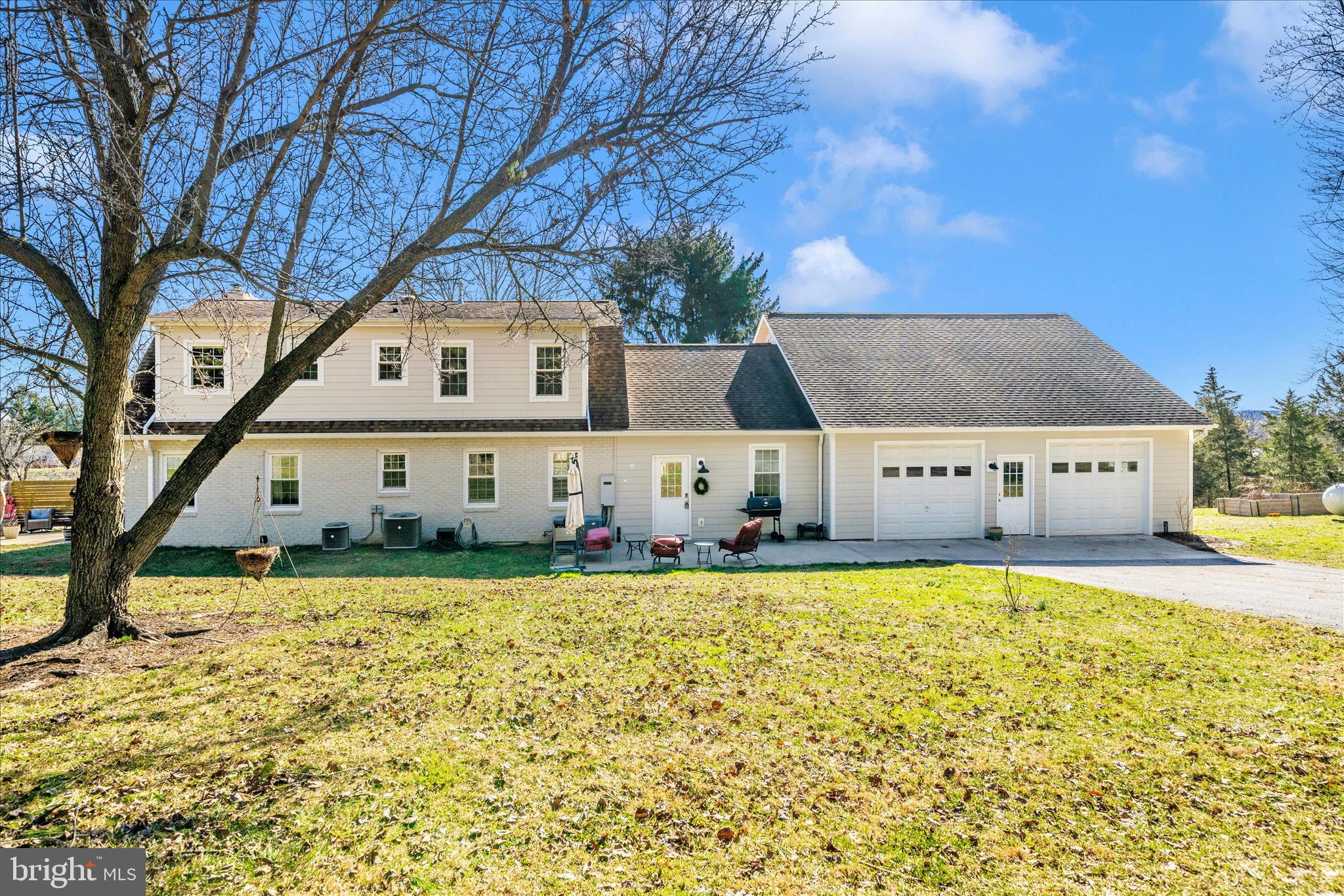 8730 Mapleville Road Mount Airy, MD 21771 - Photo 44 of 65 a house with garden in front of it