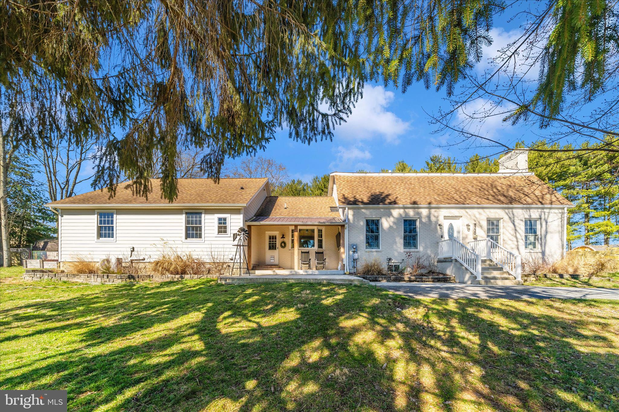 8730 Mapleville Road Mount Airy, MD 21771 - Photo 54 of 65 a front view of a house with a garden