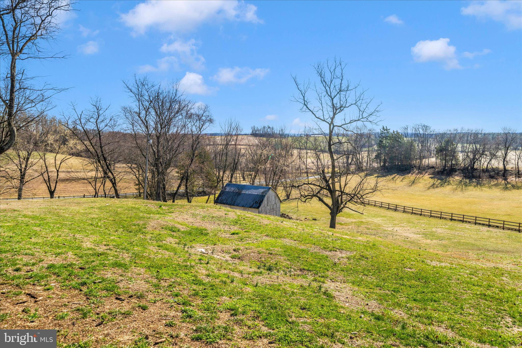 8730 Mapleville Road Mount Airy, MD 21771 - Photo 56 of 65 a view of a lake with a yard