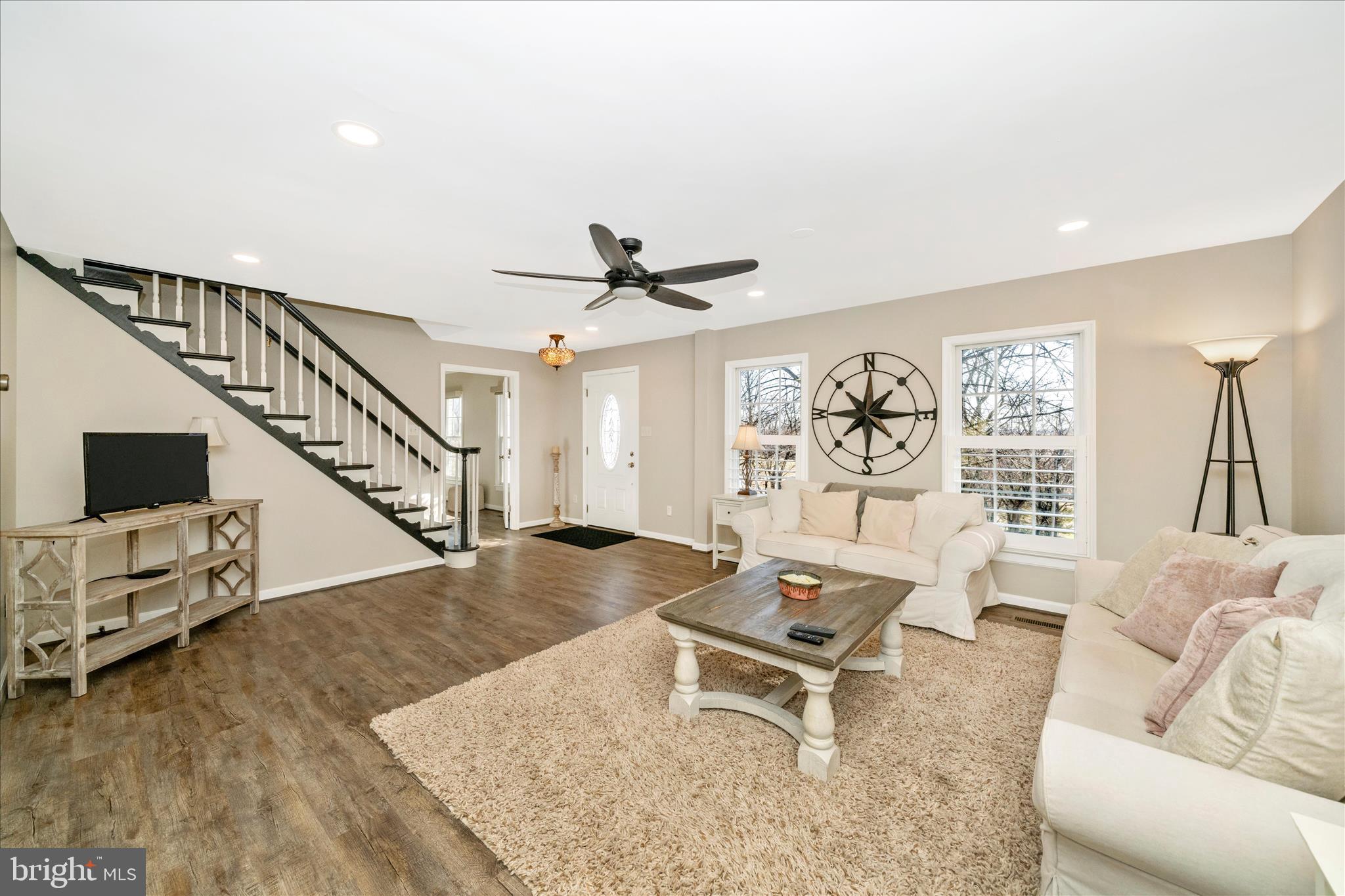 8730 Mapleville Road Mount Airy, MD 21771 - Photo 6 of 65 a living room with furniture and wooden floor
