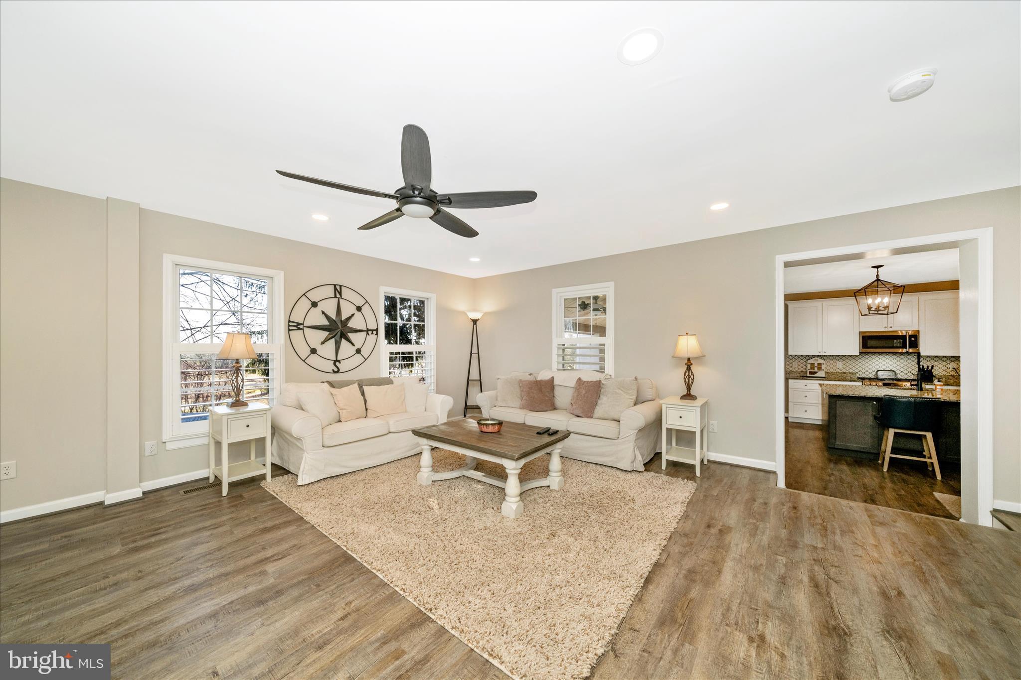 8730 Mapleville Road Mount Airy, MD 21771 - Photo 7 of 65 a living room with furniture and a large window