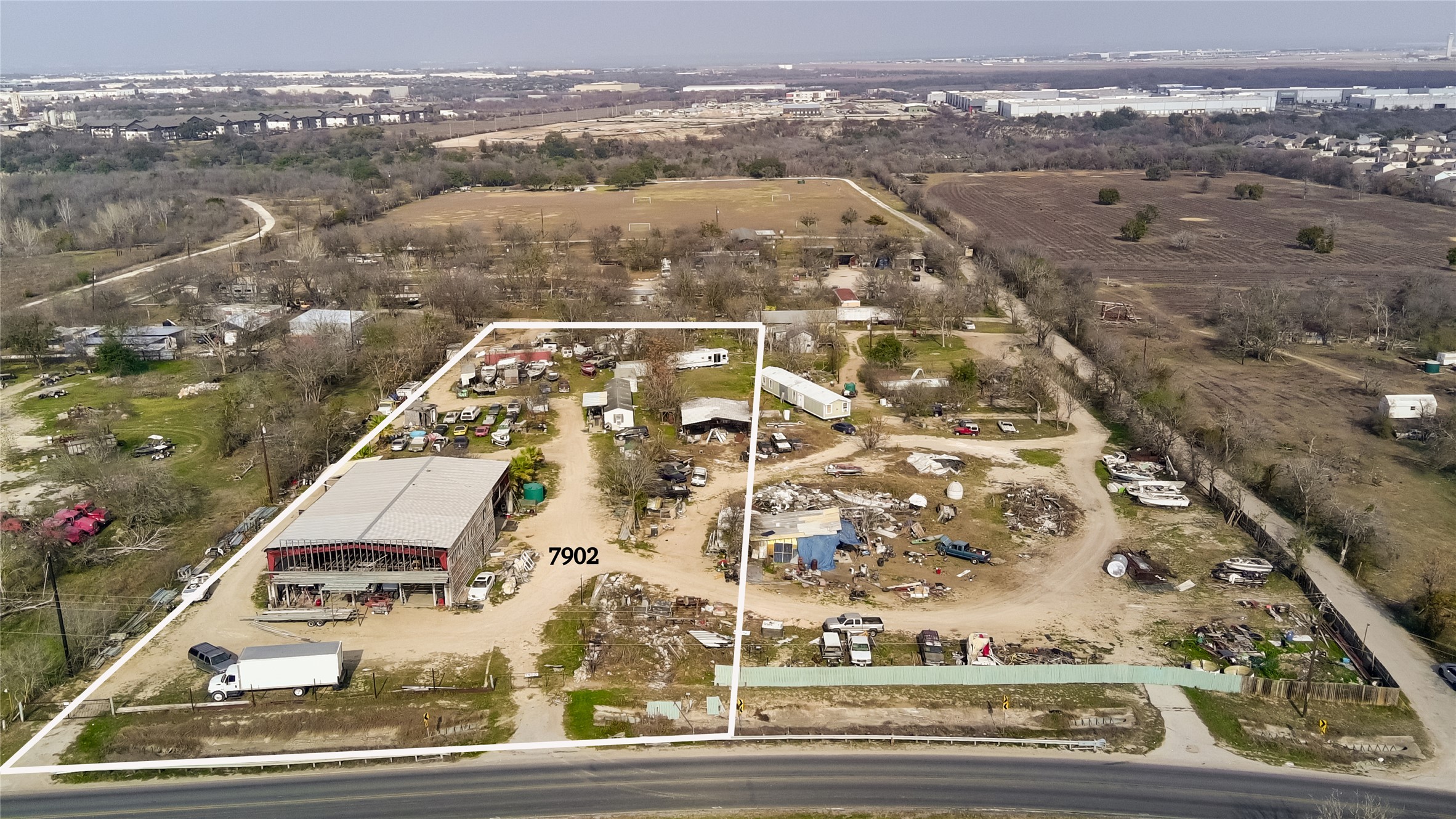 7902 Dee Gabriel Collins Road Austin, TX 78744 - Photo 1 of 2 an aerial view of a city