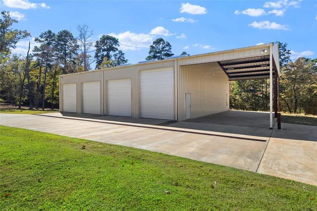 a view of a backyard of the house