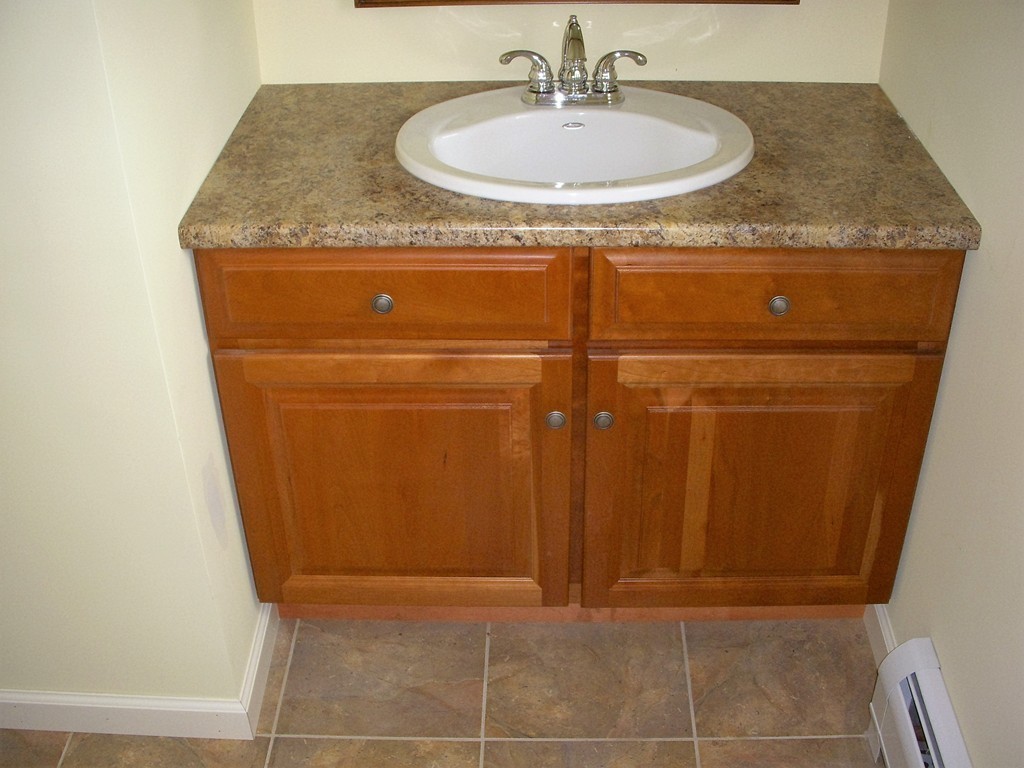 16 Sunderland Road Montague, MA 01351 - Photo 7 of 9 a bathroom with a sink and a mirror
