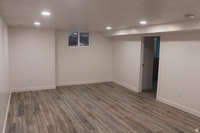 545 100 East Bountiful, UT 84010 - Photo 10 of 17 Finished below grade area featuring wood finished floors and recessed lighting