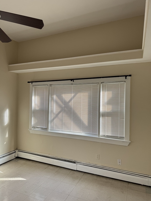 31 Moreland Street, Unit 2 Boston, MA 02119 - Photo 7 of 9 a view of a air conditioner and a window