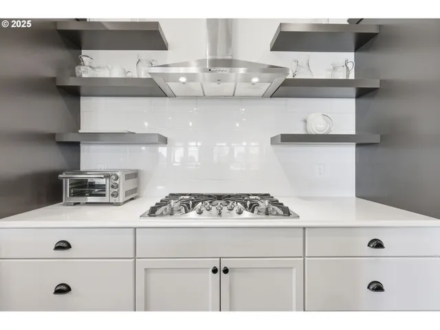 a view of cabinets with wooden floor