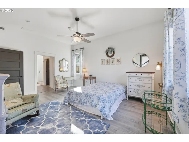 a bathroom with a double vanity sink and mirror
