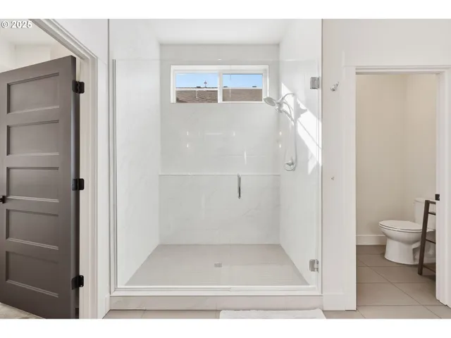 a view of a garage and car parked