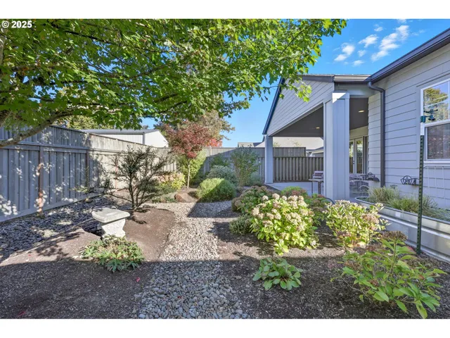 a view of a front of a house with a yard
