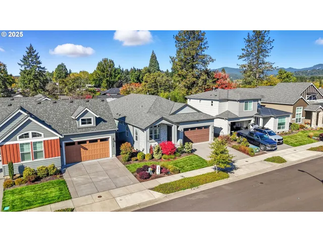 an aerial view of a house with a garden
