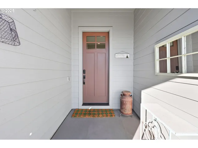 a view of livingroom with furniture and window