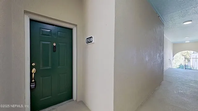 a view of a bathroom from a hallway