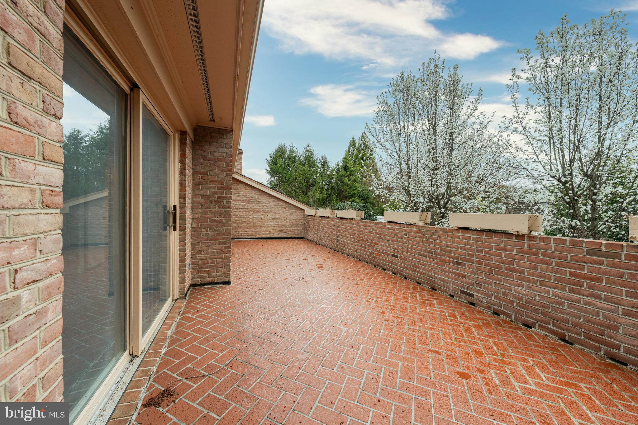 1213 Potomac School Road McLean, VA 22101 - Photo 31 of 52 Private Brick Herringbone Deck