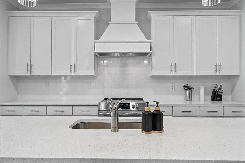 813 Coleman Street Southwest Atlanta, GA 30310 - Photo 13 of 39 a kitchen with a sink and cabinets
