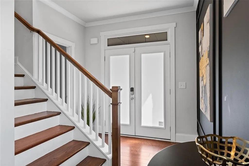 813 Coleman Street Southwest Atlanta, GA 30310 - Photo 21 of 39 a view of a hallway with wooden floor and stairs