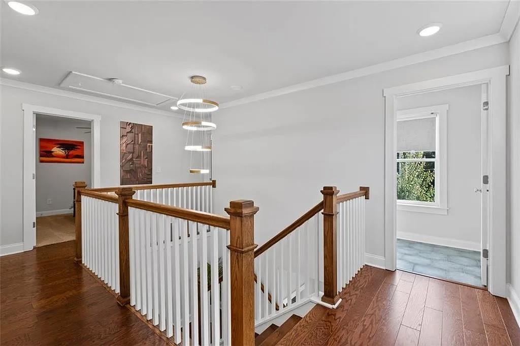 813 Coleman Street Southwest Atlanta, GA 30310 - Photo 22 of 39 a view of a hallway with wooden floor and windows