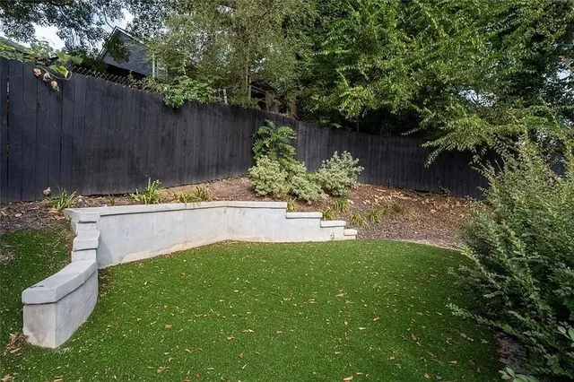 a view of swimming pool with a patio