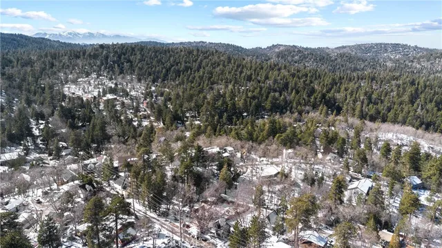 a view of mountain view with lots of trees