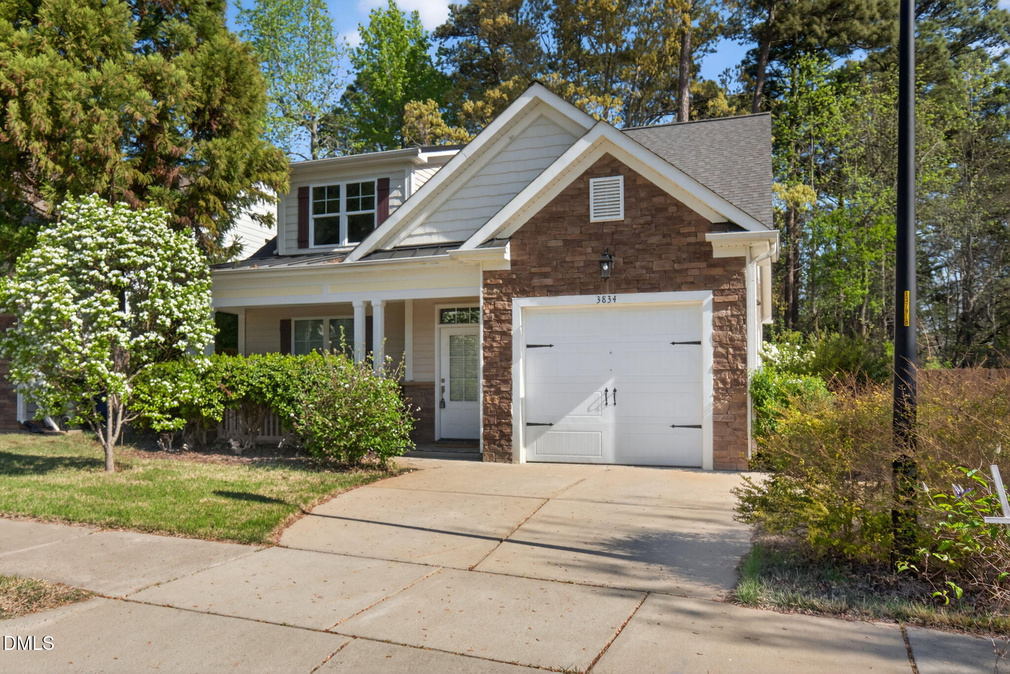 3834 Cumberland Pond Road Raleigh, NC 27606 - Photo 1 of 31 front view of house with a yard and trees all around