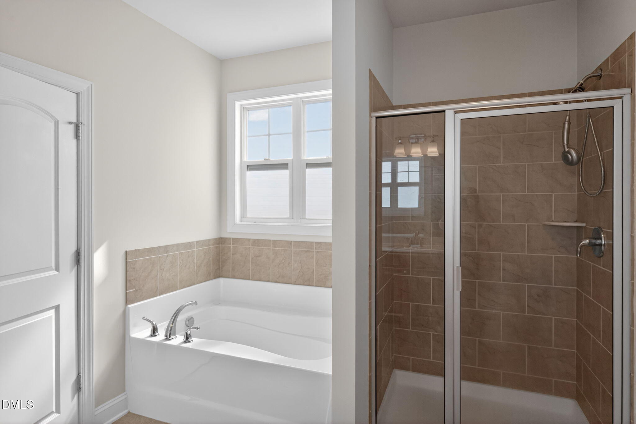 3834 Cumberland Pond Road Raleigh, NC 27606 - Photo 17 of 31 a bath tub sitting next to a window