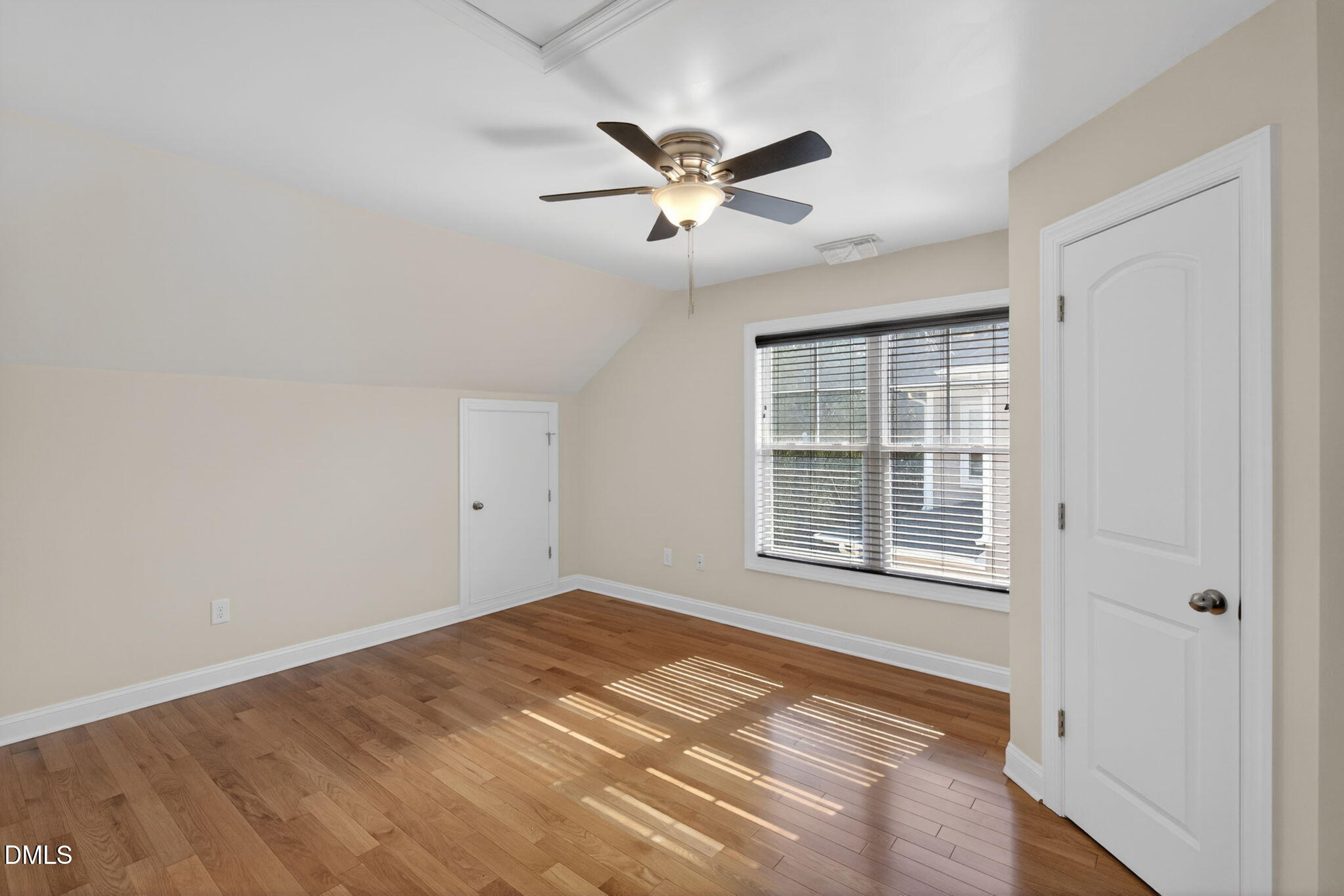 3834 Cumberland Pond Road Raleigh, NC 27606 - Photo 22 of 31 a view of a big room with wooden floor and windows in a room