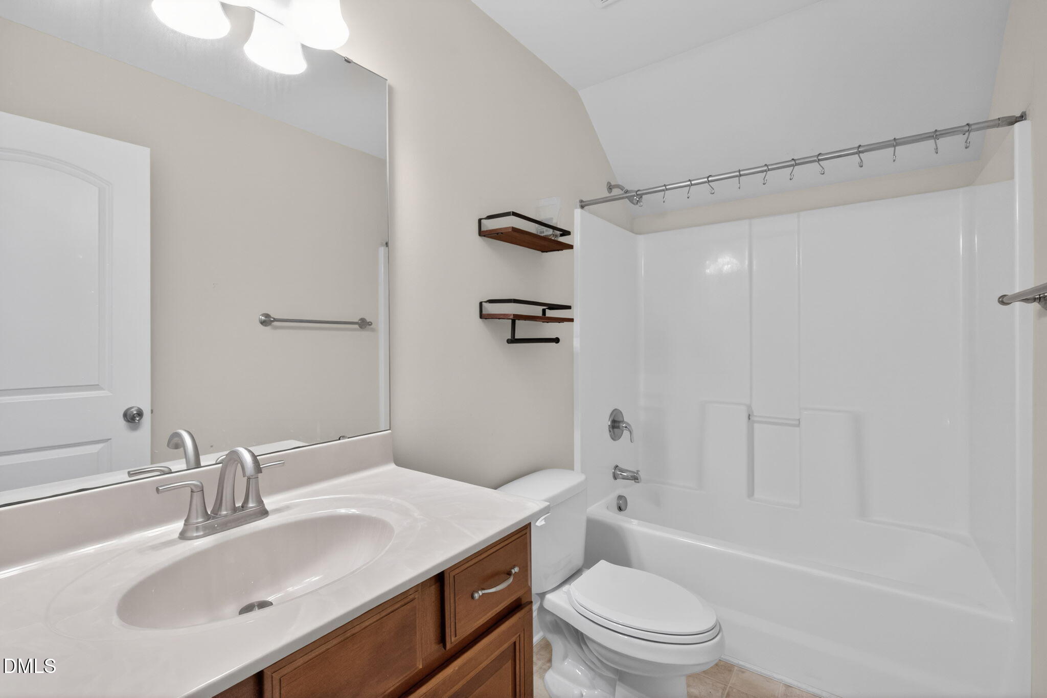 3834 Cumberland Pond Road Raleigh, NC 27606 - Photo 23 of 31 a bathroom with a sink toilet and shower