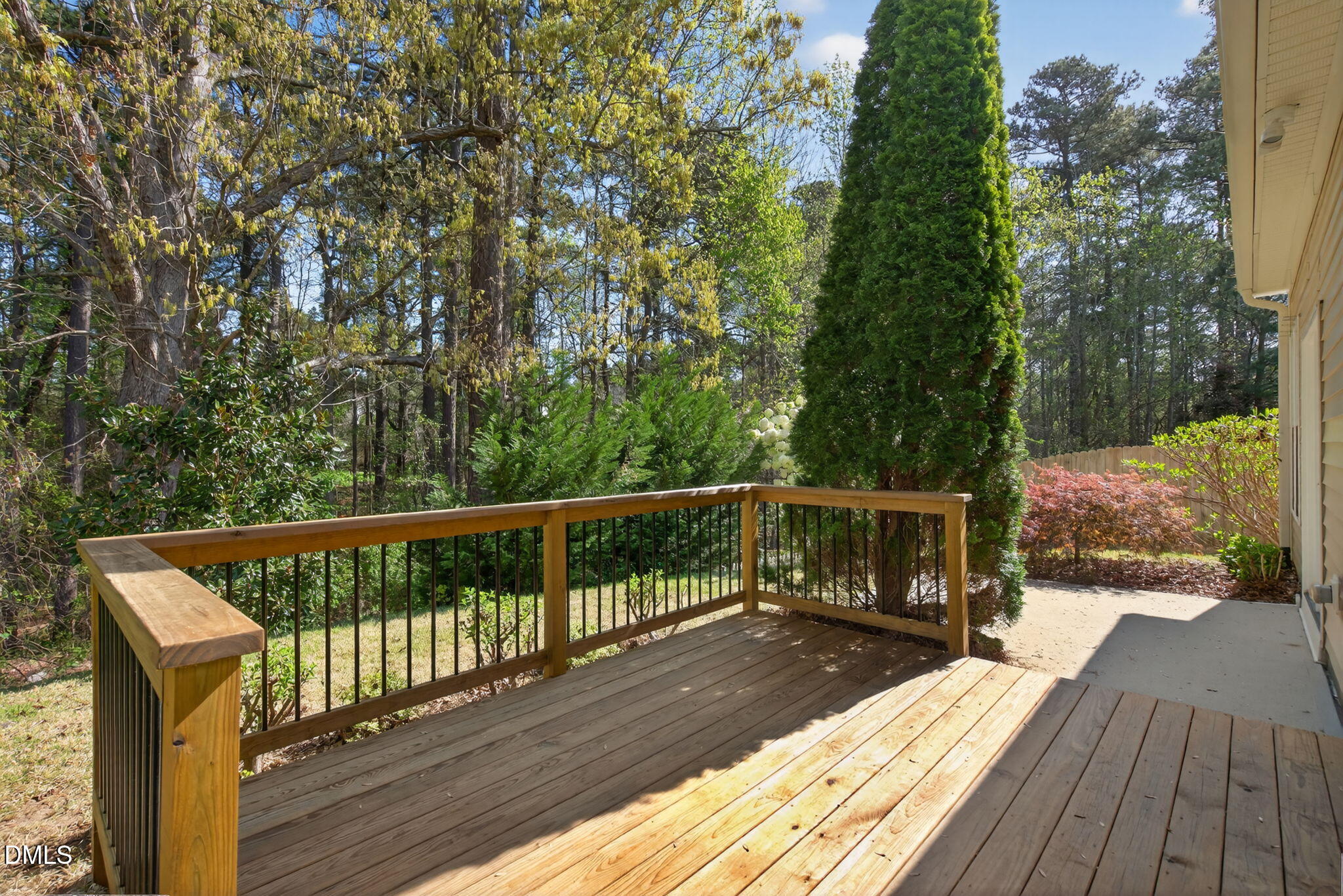 3834 Cumberland Pond Road Raleigh, NC 27606 - Photo 24 of 31 a view of balcony with wooden floor and fence